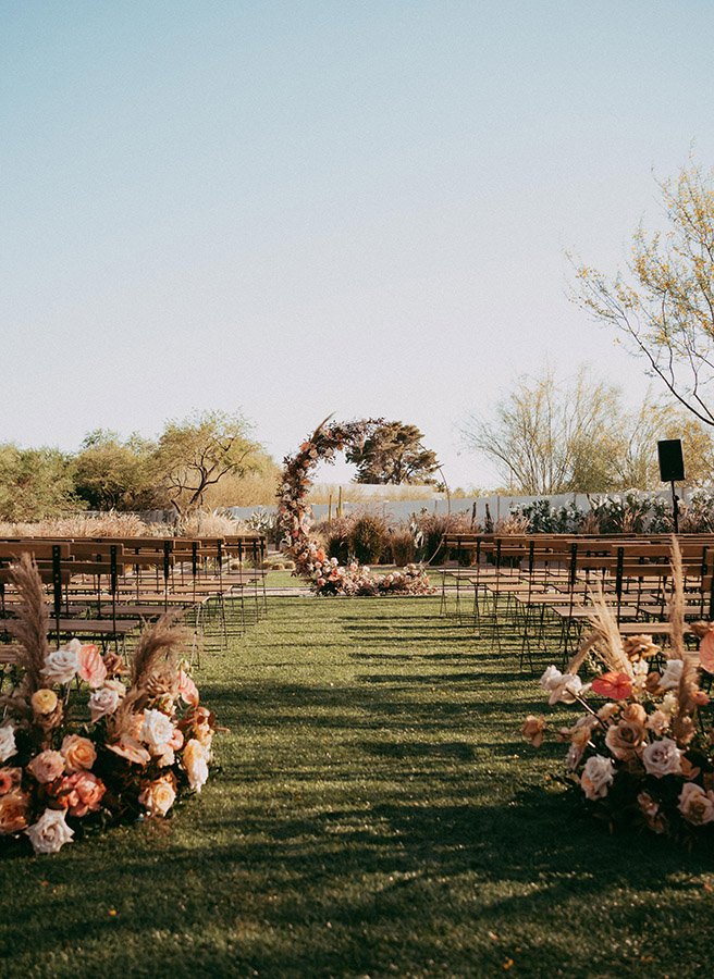 Bride and groom sharing a sunset moment in the desert garden at Andaz Scottsdale