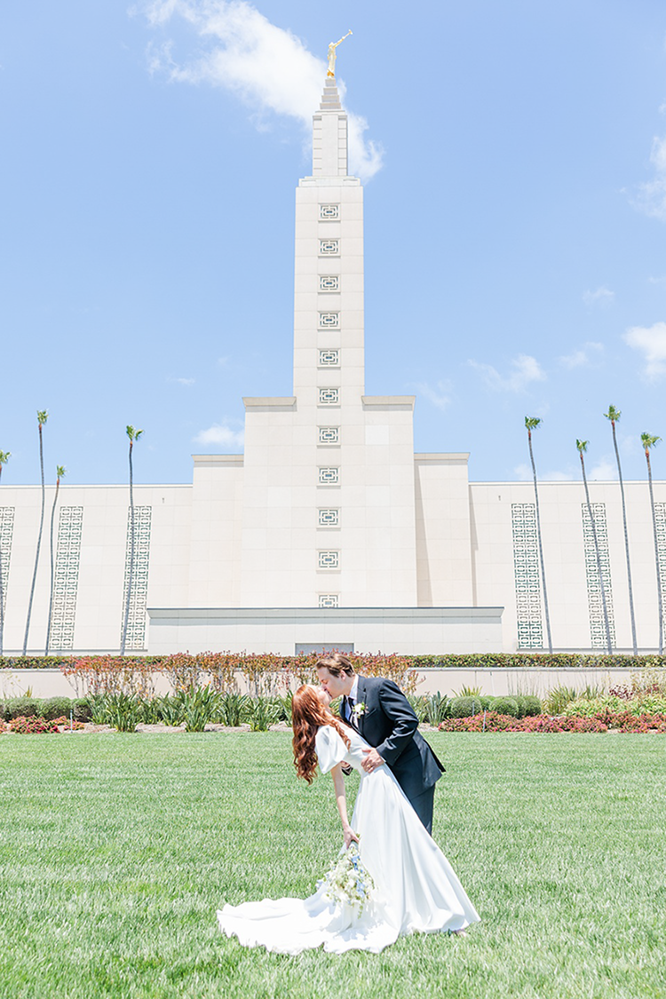 Beachfront wedding ceremony in Santa Monica with large guest seating and ocean views