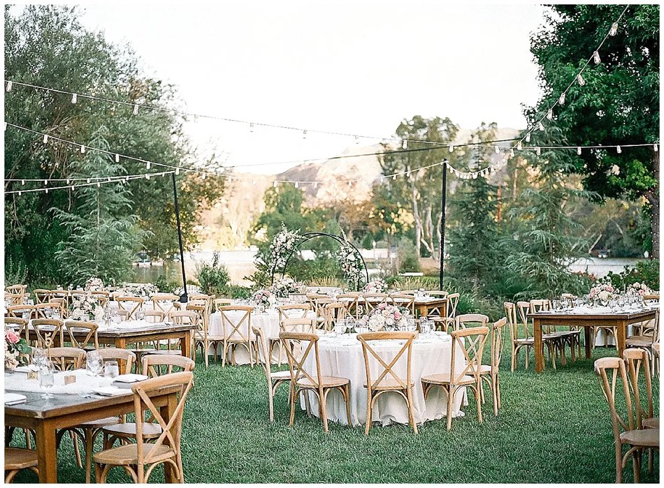 Malibou Lake lodge wedding reception with bistro lights—mountain-lake destination near Phoenix.