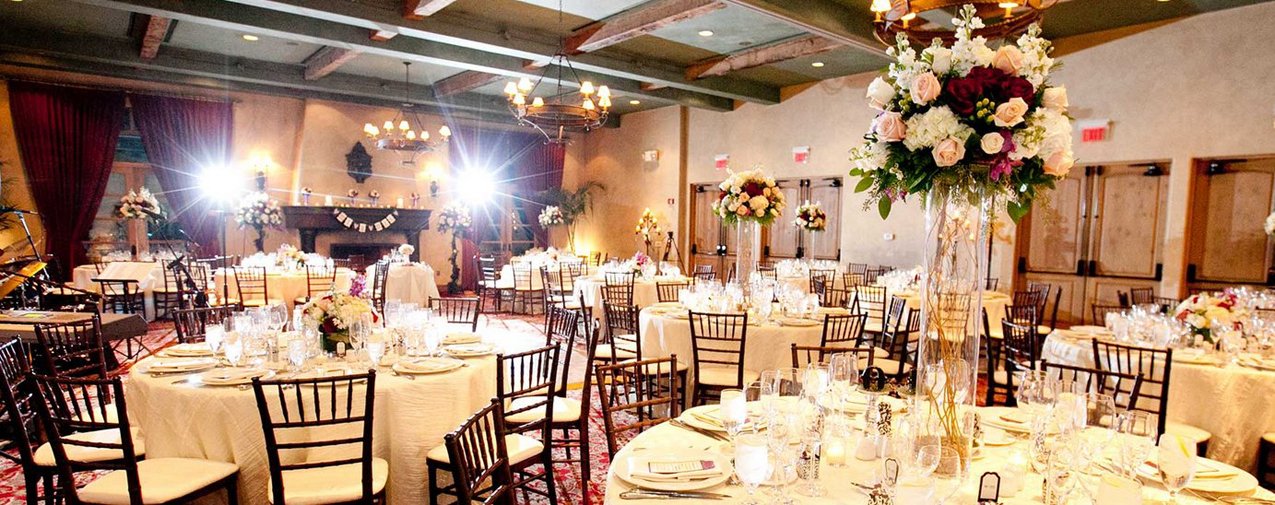 Bride and groom portraits in Mediterranean courtyard at Royal Palms