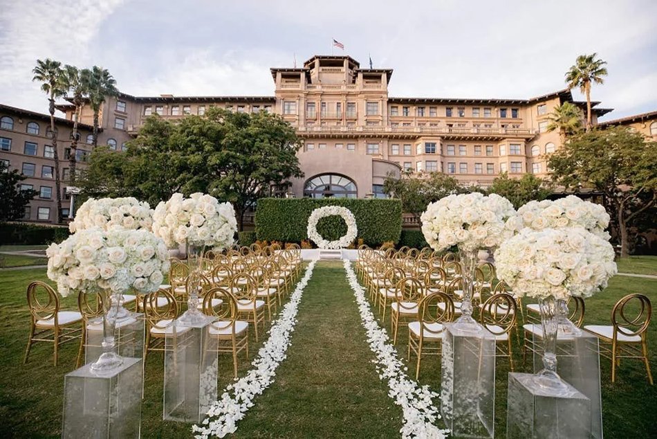 Grand Hotel Lawn Ceremony with White Roses and Gold Chairs Grand lawn wedding ceremony with gold chairs and white roses at a historic Southern California hotel