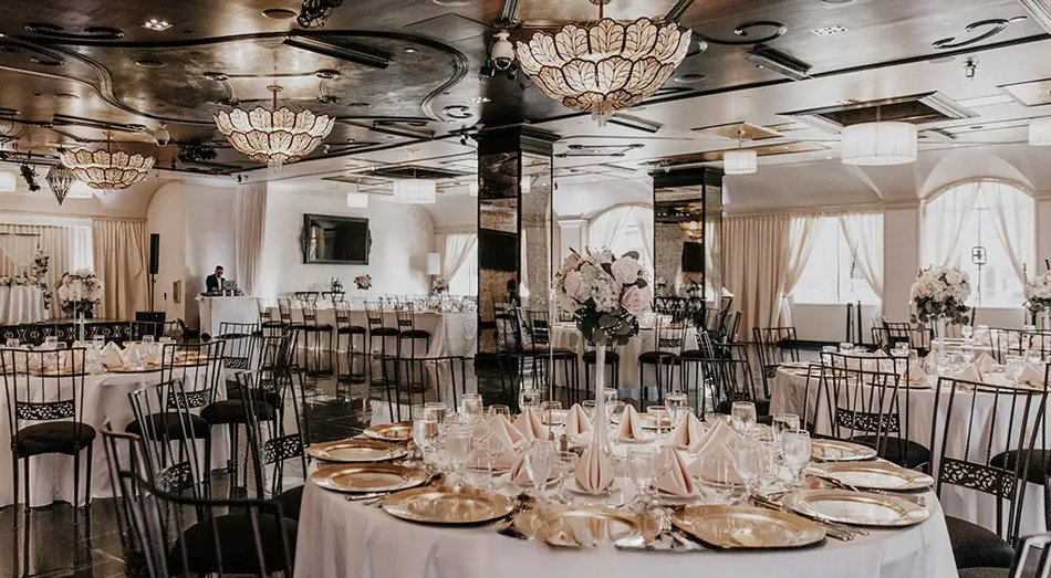 Los Angeles ballroom wedding with dramatic reception lighting and modern design