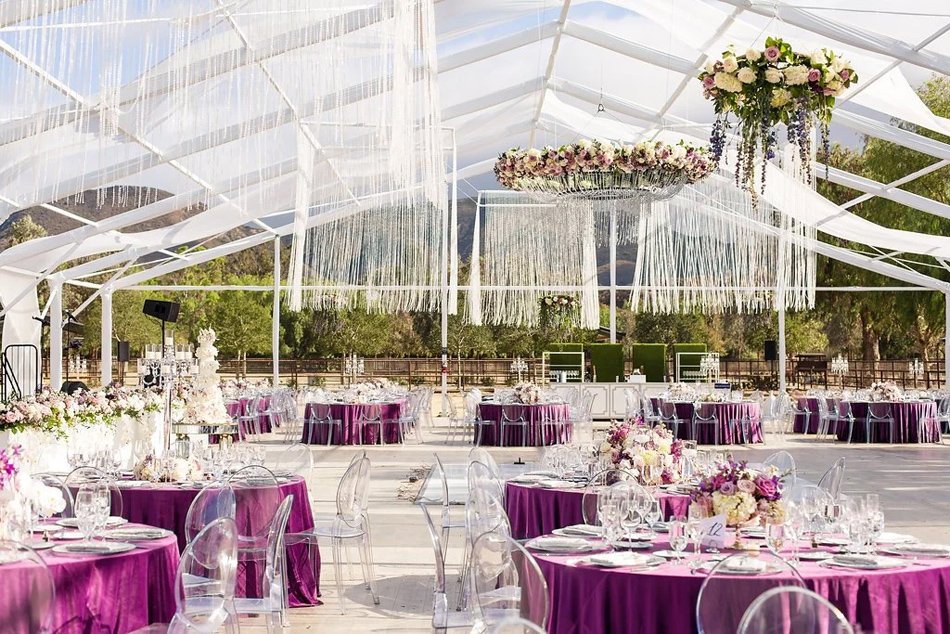 Clear-Top Tented Reception in Southern California Wine Country Clear-top tented wedding with crystal fringe and purple tables in Southern California wine country