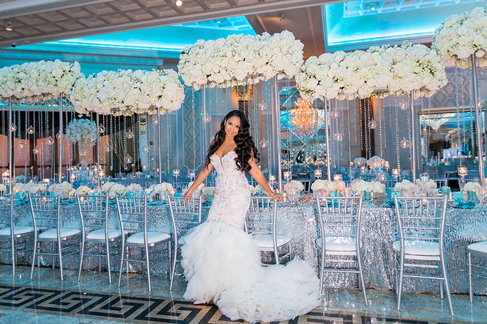 Glamorous Crystal and White-Floral Ballroom Reception Glamorous luxury ballroom reception with mirrored details and white floral runners in Southern California