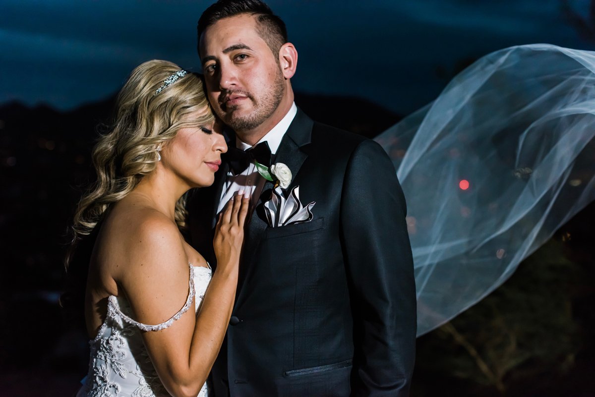 Dramatic black-and-white portrait of a bride and groom captured by an Arizona wedding photographer