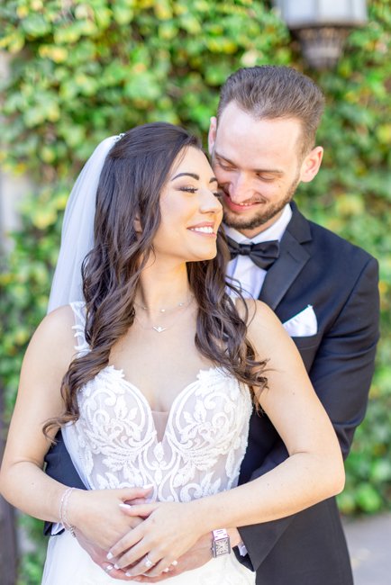 Wedding photography at Omni Montelucia wedding venue Alexis and Jake share a kiss at Omni Montelucia