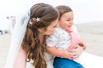 Romantic kiss under cloudy California sky