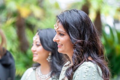 south-asian-bride-and-bridesmaid-laughing-portrait